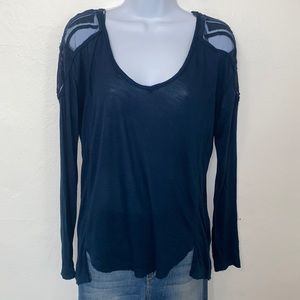 Blouse from Free People. Long sleeve cotton Mesh accents cutout design.